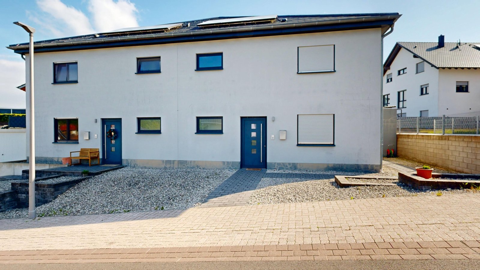 Paketpreis: Zwei Doppelhaushälften mit Garagen & Garten in grüner Ortsrandlage