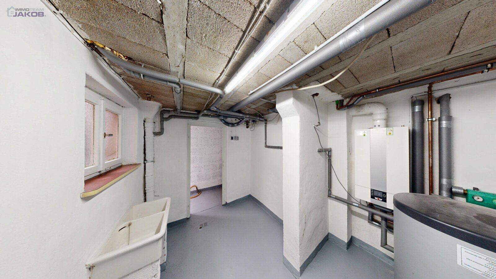 *VERKAUFT* | Freistehendes Zweifamilienhaus mit Garten & Garagen in familienfreundlicher Wohnlage